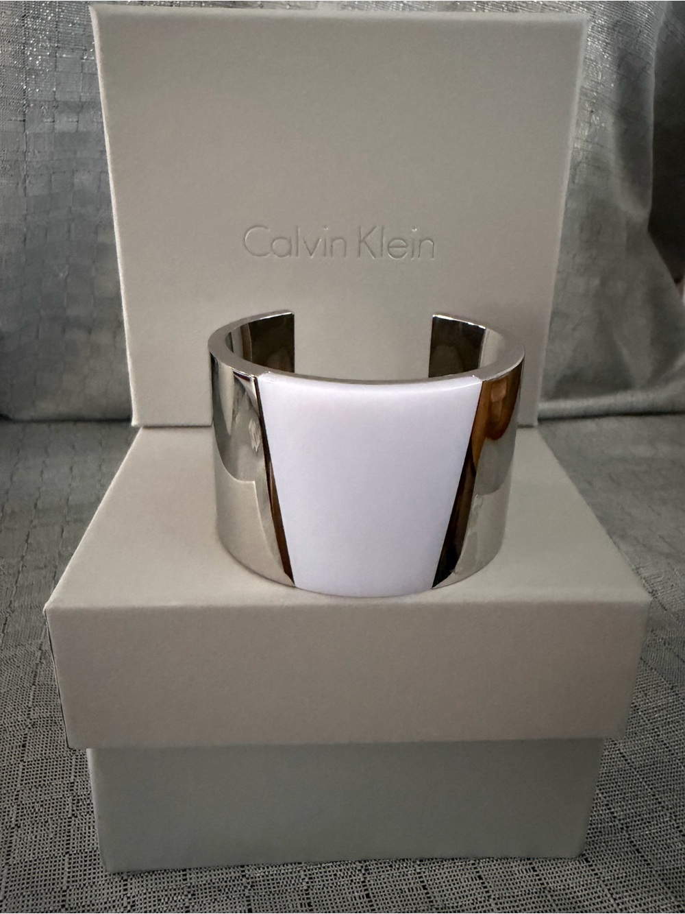 Calvin Klein Silver Tone Cuff Bracelet with White Center Panel
